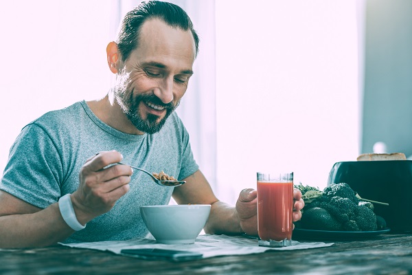 man eating breakfast