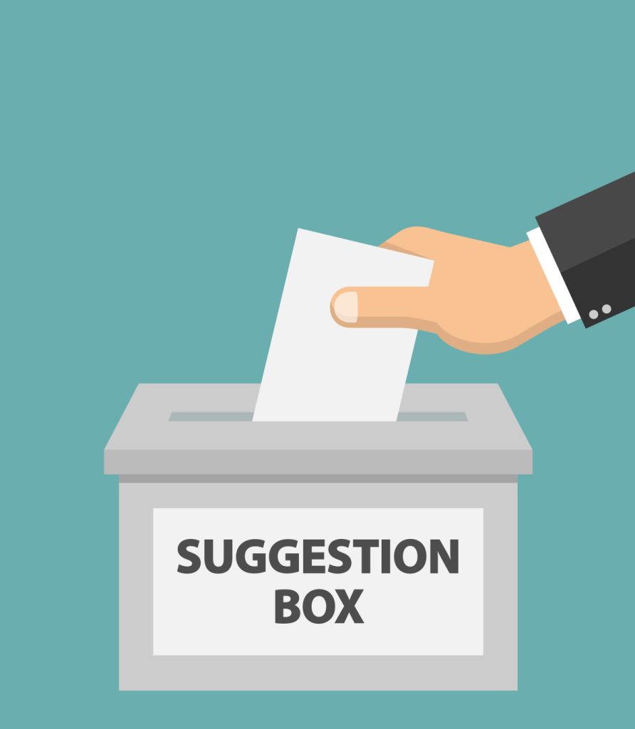 Vector graphic of a hand slipping a suggestion note into a suggestion box