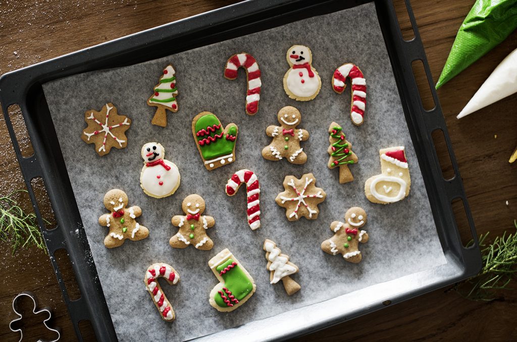 Christmas cookies of stockings, snowmen, christmas tree, and candy cane 