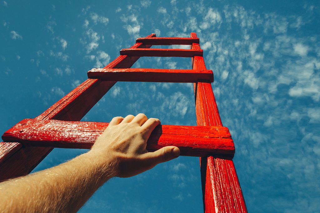 A ladder leading up to the sky, with someone's hand grabbing onto it,