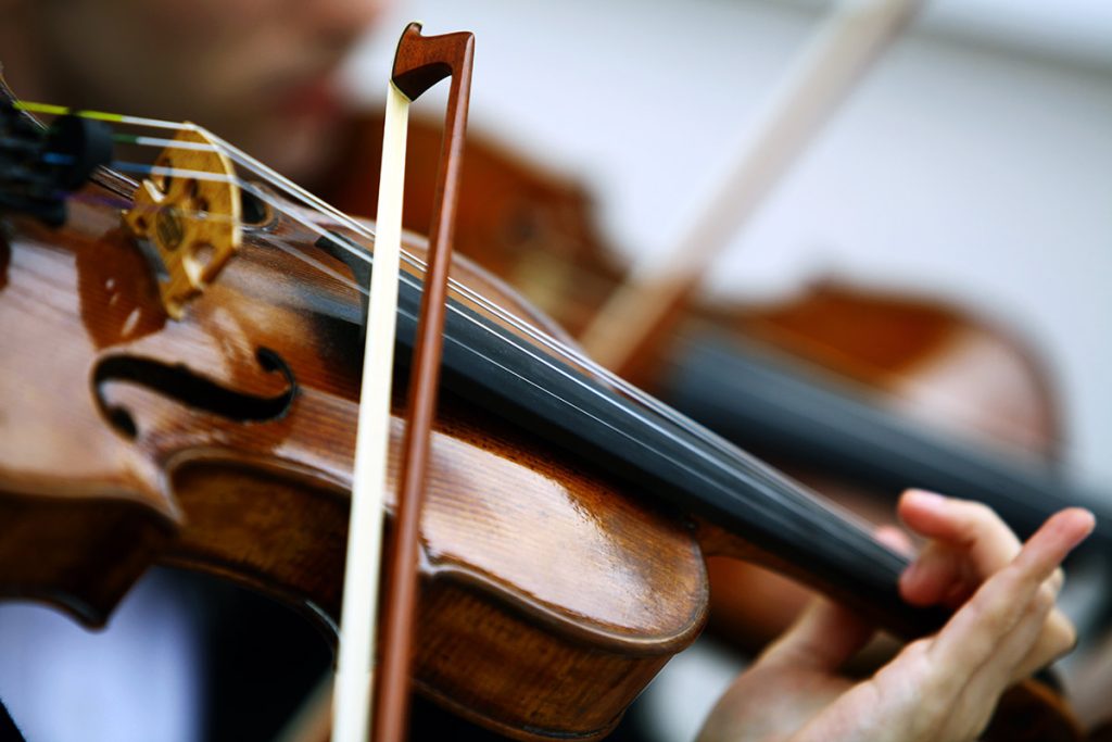 close up image of violin being played
