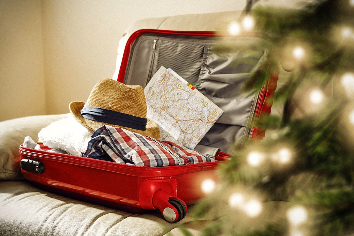Christmas suitcase and christmas tree decoration.
