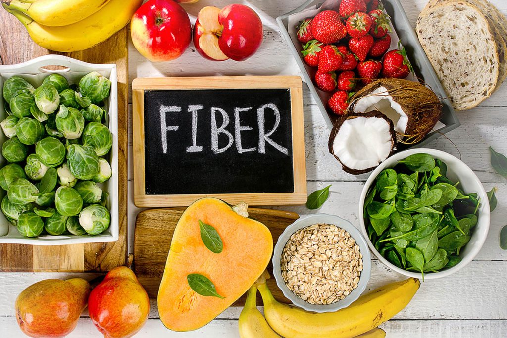 High Fiber Foods on  wooden background. Flat lay