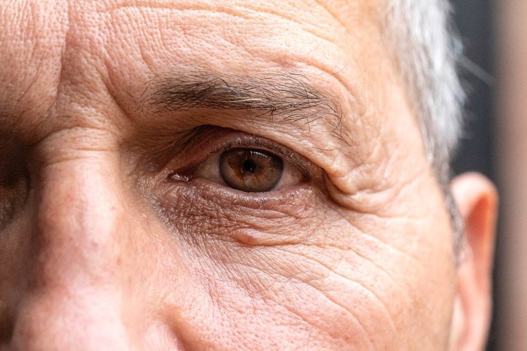 close up of senior man's eye